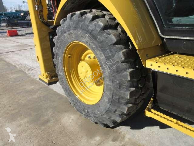 Traktor med grab Caterpillar 432
