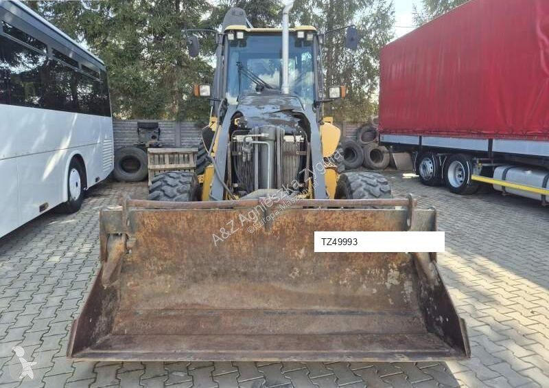 Traktor med grab Volvo