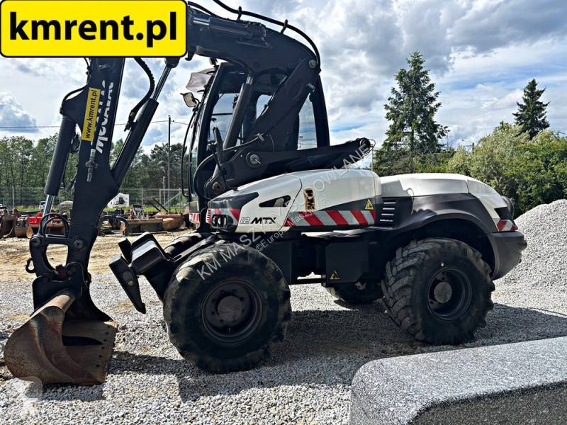 Koparko-ładowarka Mecalac 12 MTX...