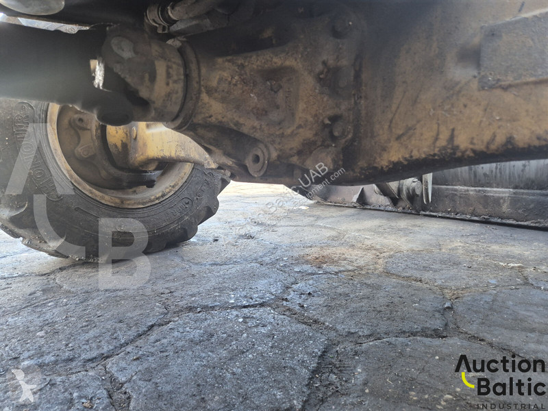 Екскаватор навантажувач Caterpillar