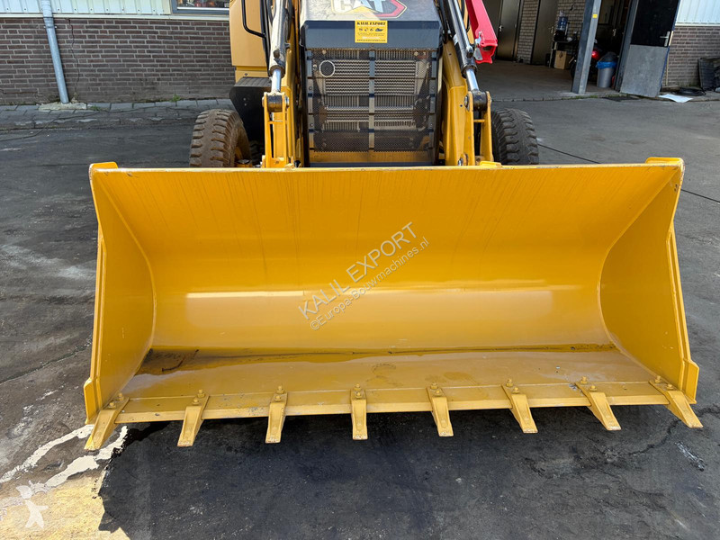 Экскаватор-погрузчик Caterpillar 424 Backhoe...