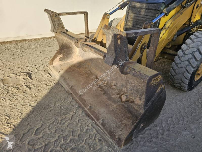 لودر حفار Caterpillar