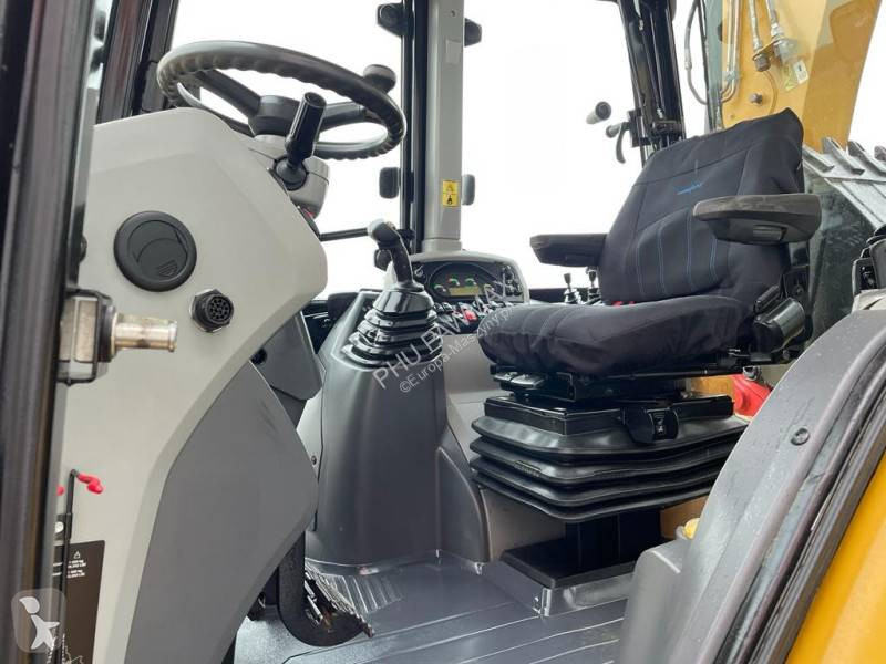 Traktor med grab Caterpillar 444 F2