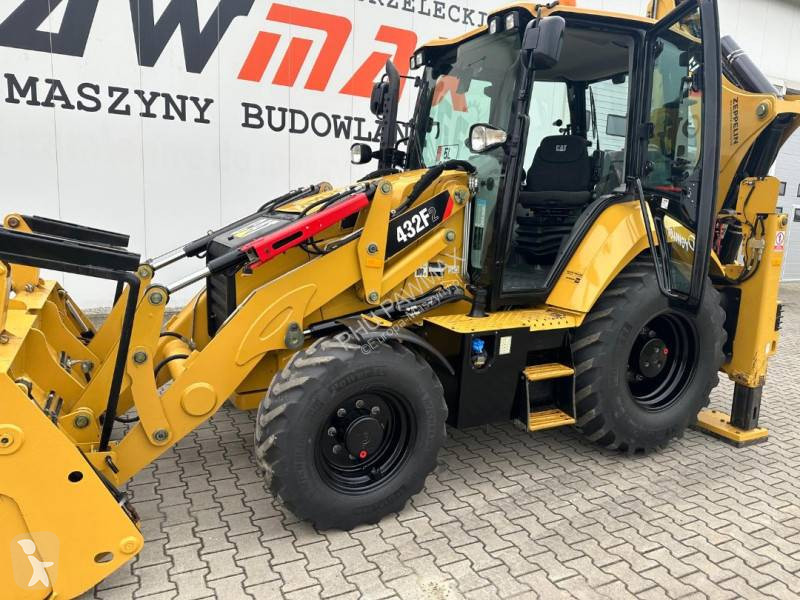 لودر حفار Caterpillar 2