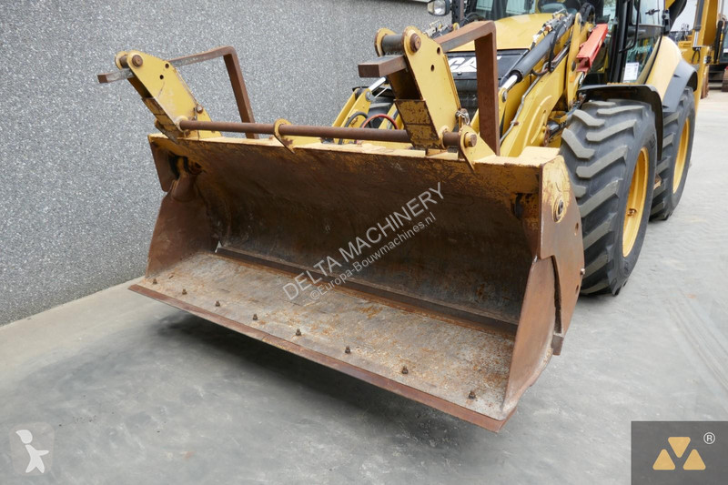 Traktor med grab Caterpillar 444F