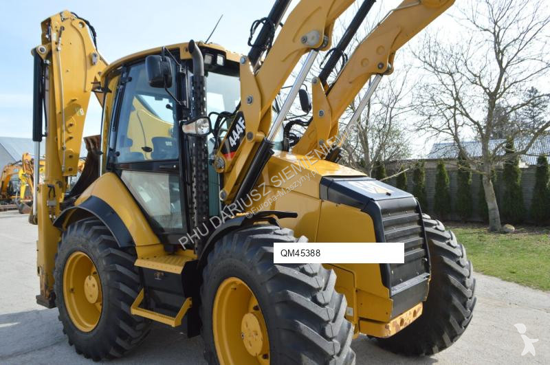 Traktor med grab Caterpillar 444F