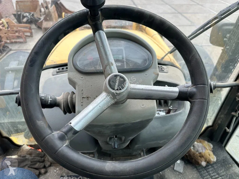 Traktor med grab Komatsu E0