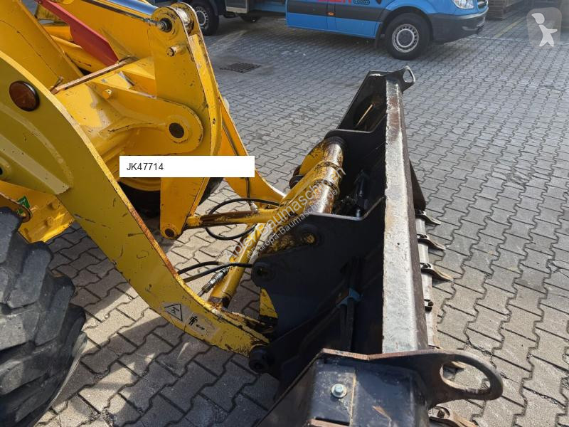 Traktor med grab Komatsu