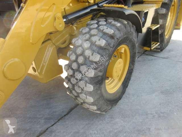Traktor med grab Caterpillar 432