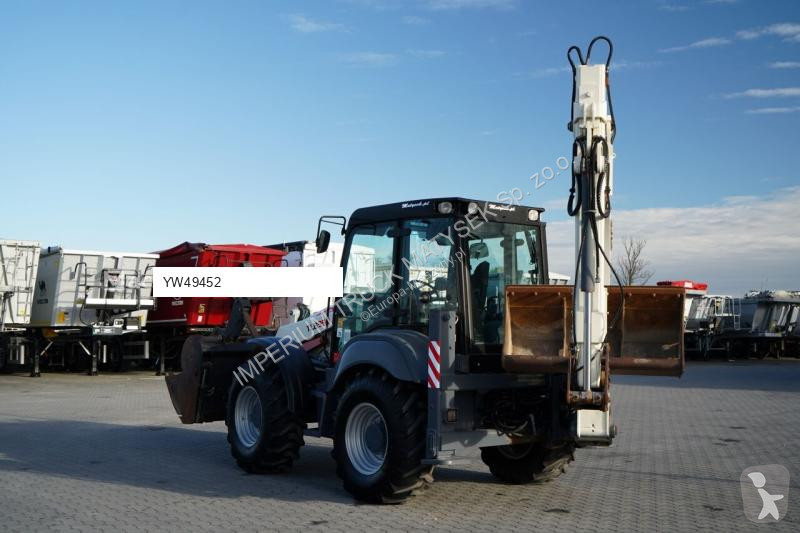 Traktor med grab Terex TLB 990