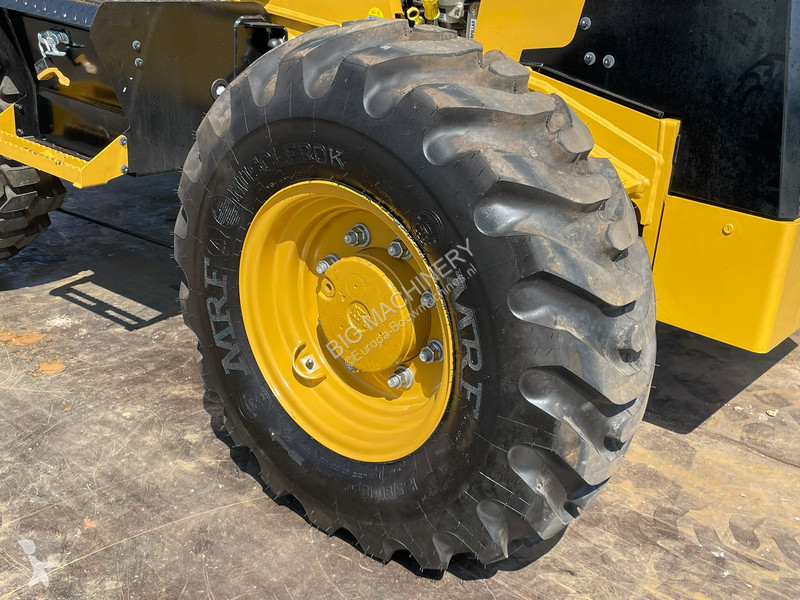 Traktor med grab Caterpillar 424