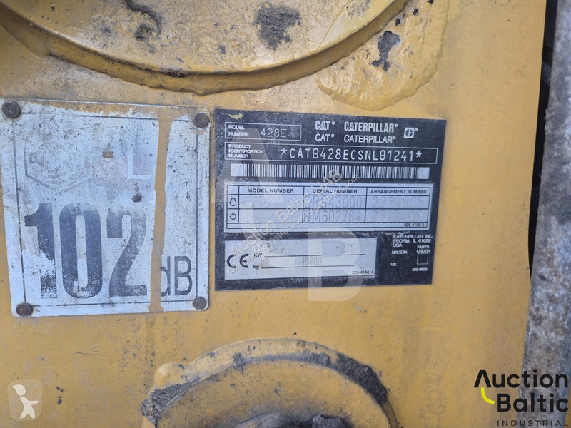 Екскаватор навантажувач Caterpillar
