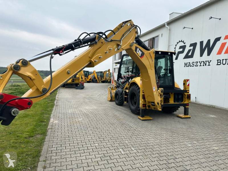 لودر حفار Caterpillar 2