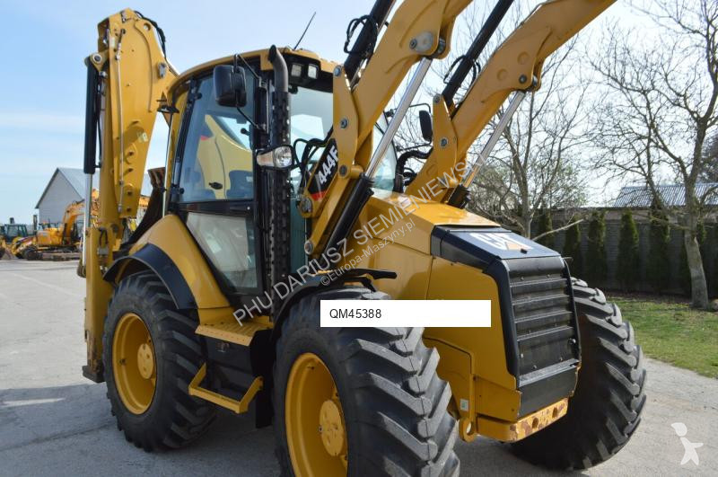 Traktor med grab Caterpillar 444F