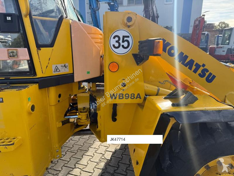 Traktor med grab Komatsu