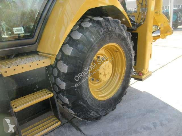 Traktor med grab Caterpillar 432