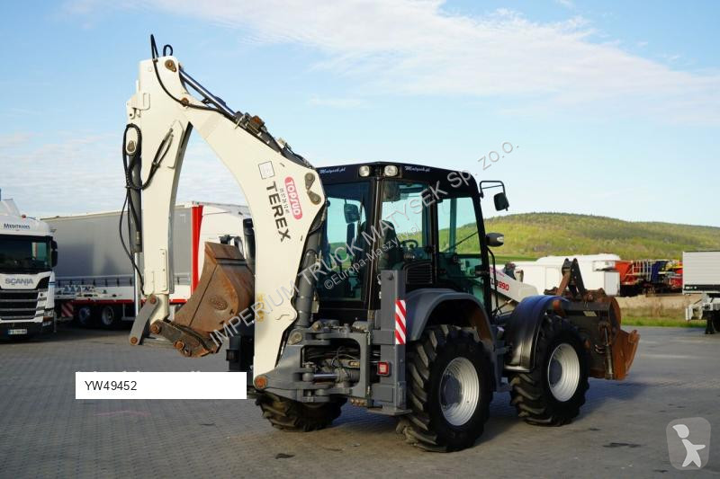 Traktor med grab Terex TLB 990
