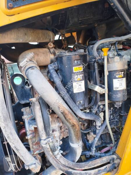 Buldoexcavator Caterpillar