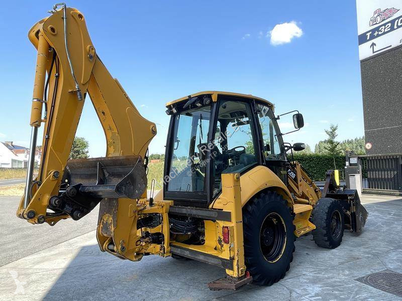 Traktor med grab Caterpillar