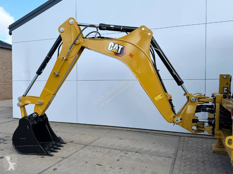 Traktor med grab Caterpillar 424 4WD - Hammer...