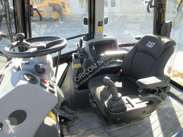 Traktor med grab Caterpillar 432