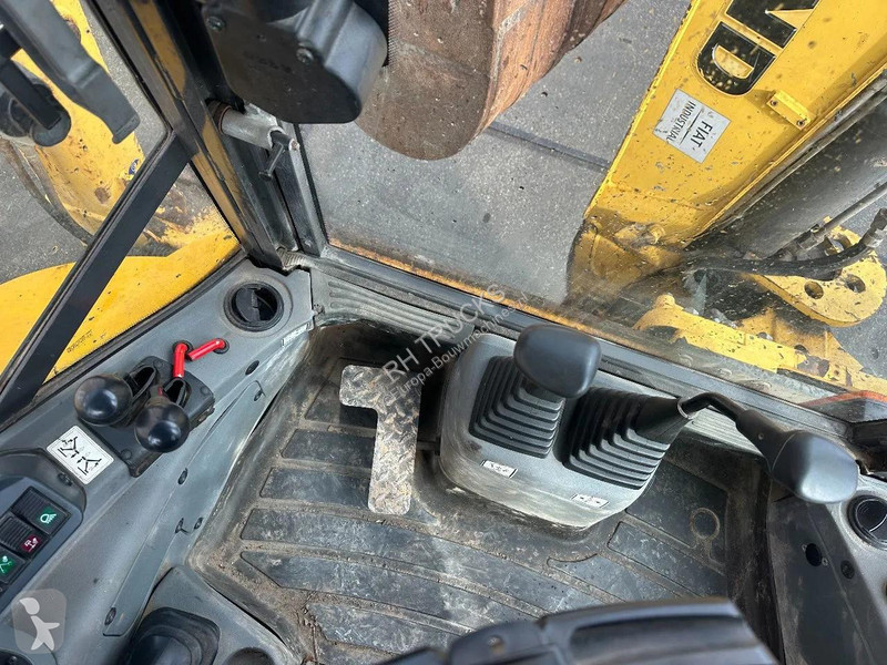 Экскаватор-погрузчик New Holland B , CE, 240 MM...