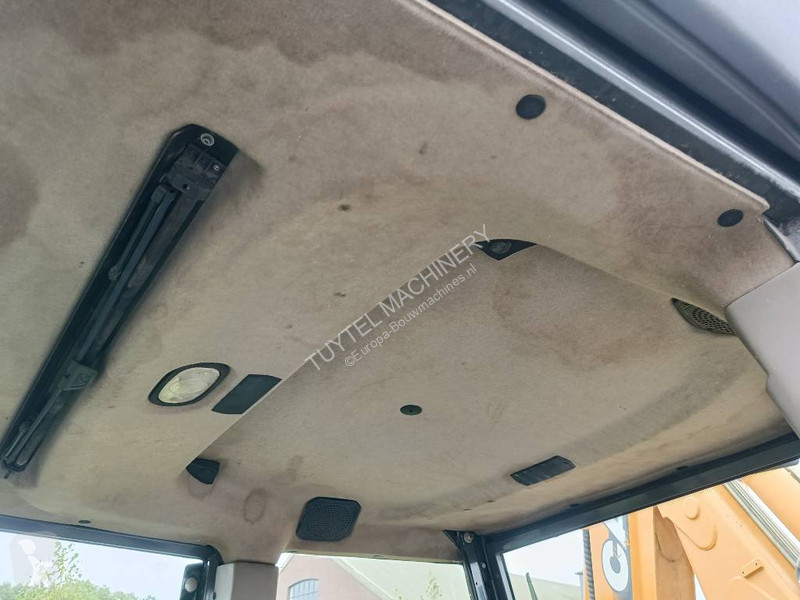 Traktor med grab Case backhoe loader graaf laad...