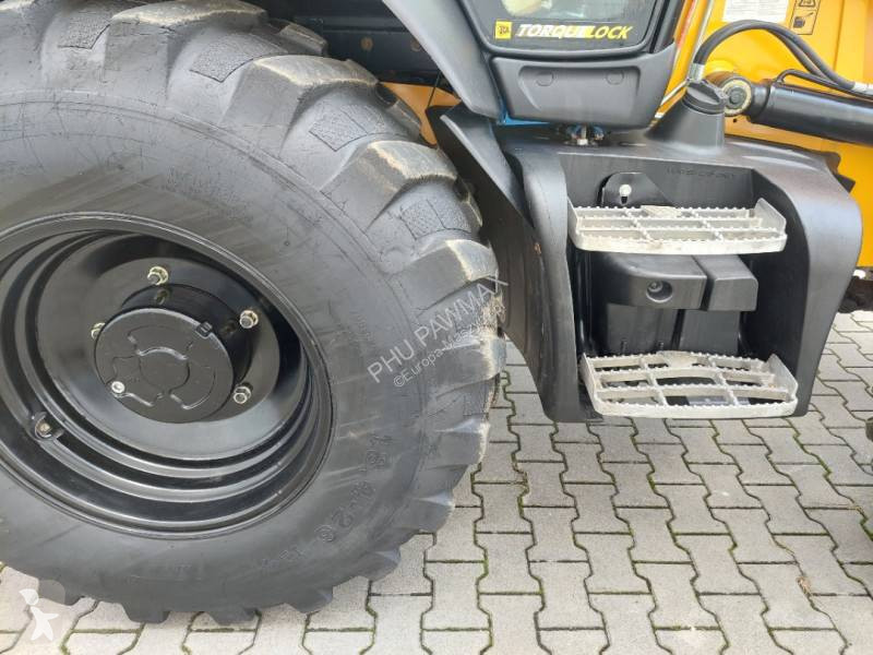 Traktor med grab JCB