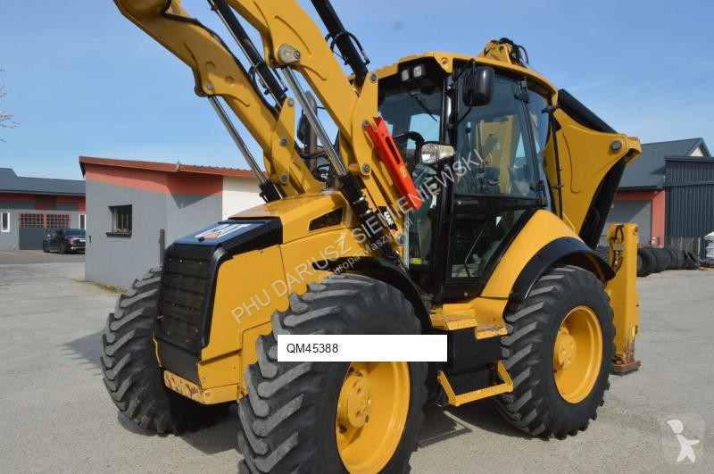 Traktor med grab Caterpillar 444F