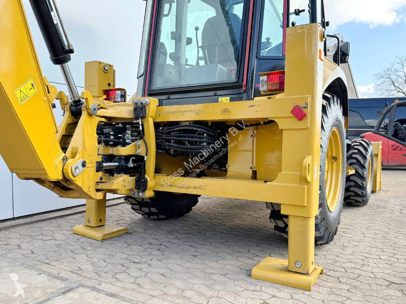 Traktor med grab Caterpillar 424 4WD - Hammer...