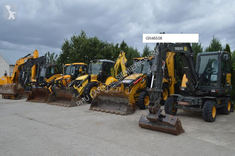 Traktor med grab Caterpillar