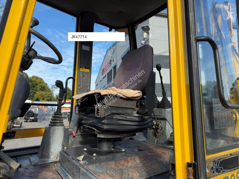 Traktor med grab Komatsu