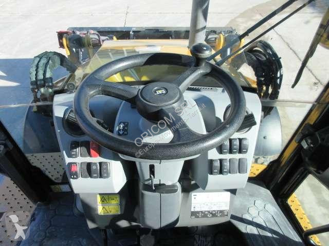 Traktor med grab Caterpillar 432