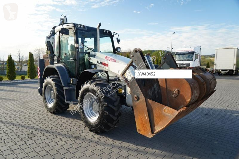 Traktor med grab Terex TLB 990