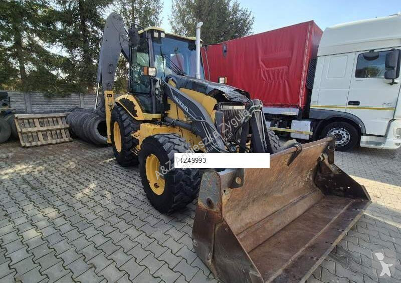 Traktor med grab Volvo