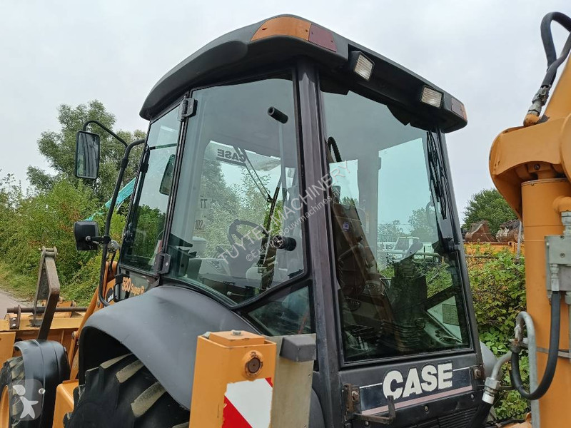 Traktor med grab Case backhoe loader graaf laad...
