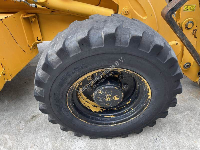 Traktor med grab Caterpillar