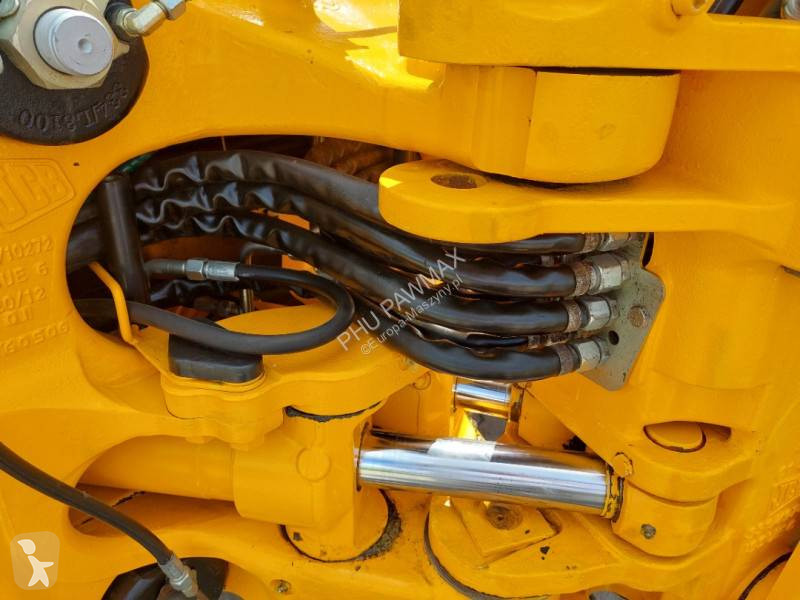Traktor med grab JCB