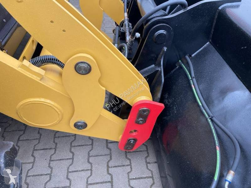 Traktor med grab Caterpillar 444 F2