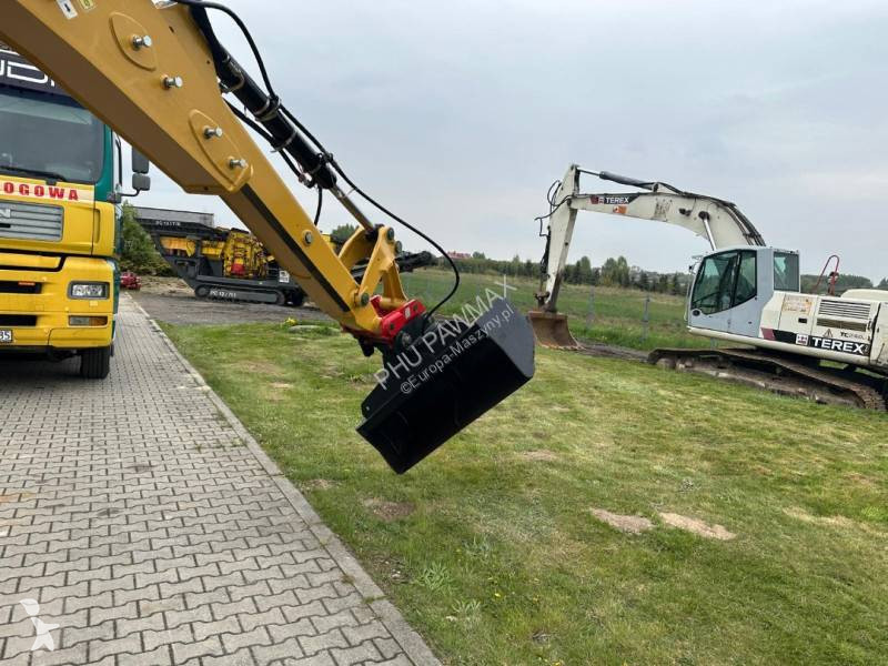 لودر حفار Caterpillar 2