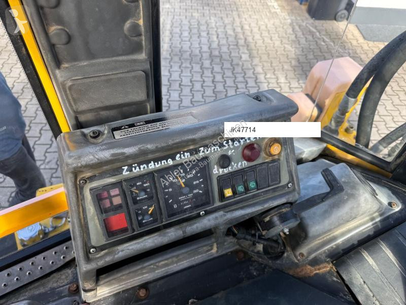 Traktor med grab Komatsu