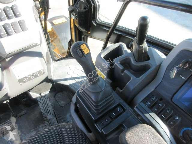 Traktor med grab Caterpillar 432