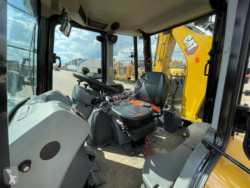 Rýpadlo-nakladač Caterpillar 424