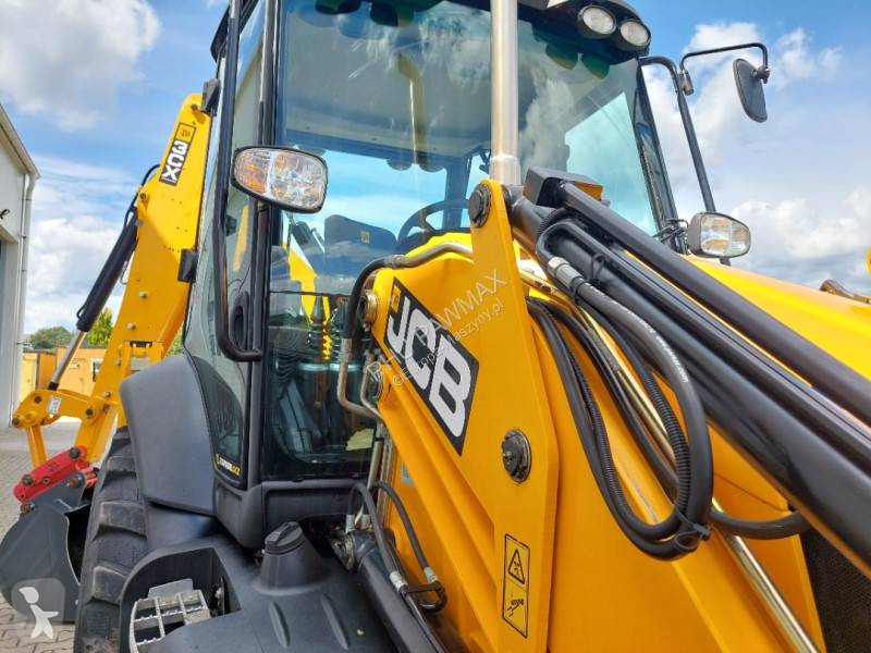 Traktor med grab JCB