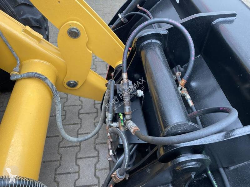 Traktor med grab Caterpillar 444 F2