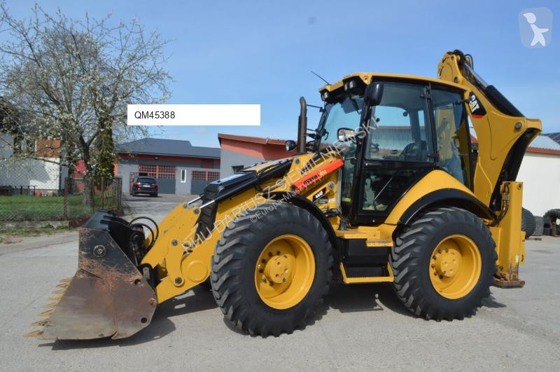 Traktor med grab Caterpillar 444F