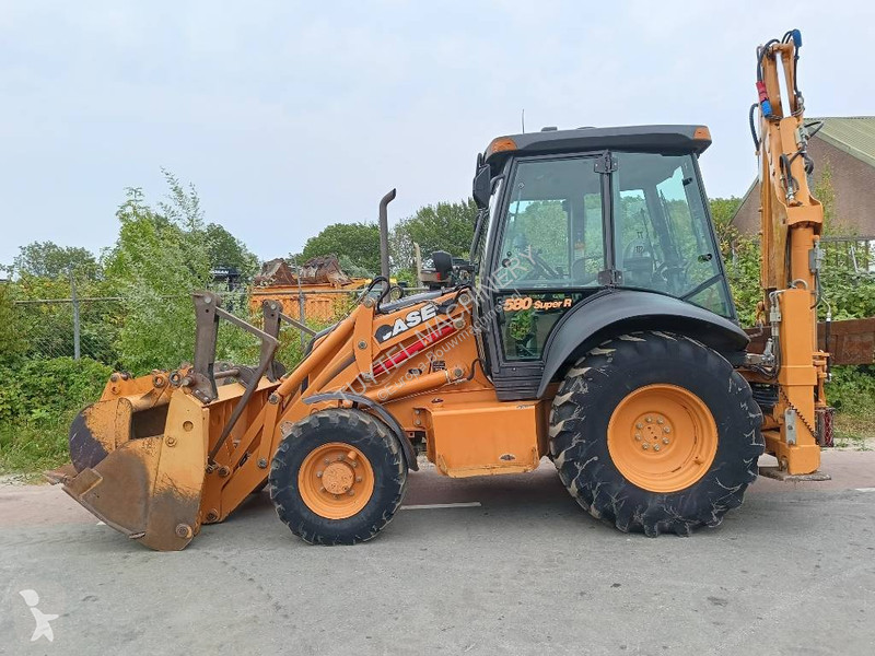 Traktor med grab Case backhoe loader graaf laad...