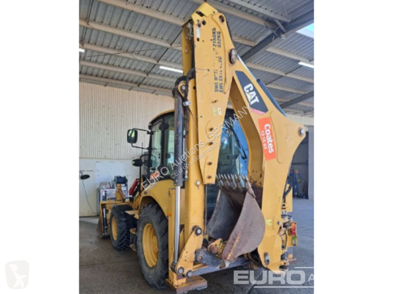Buldoexcavator Caterpillar 2