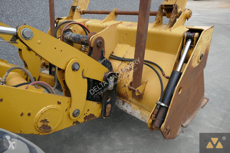 Traktor med grab Caterpillar 444F