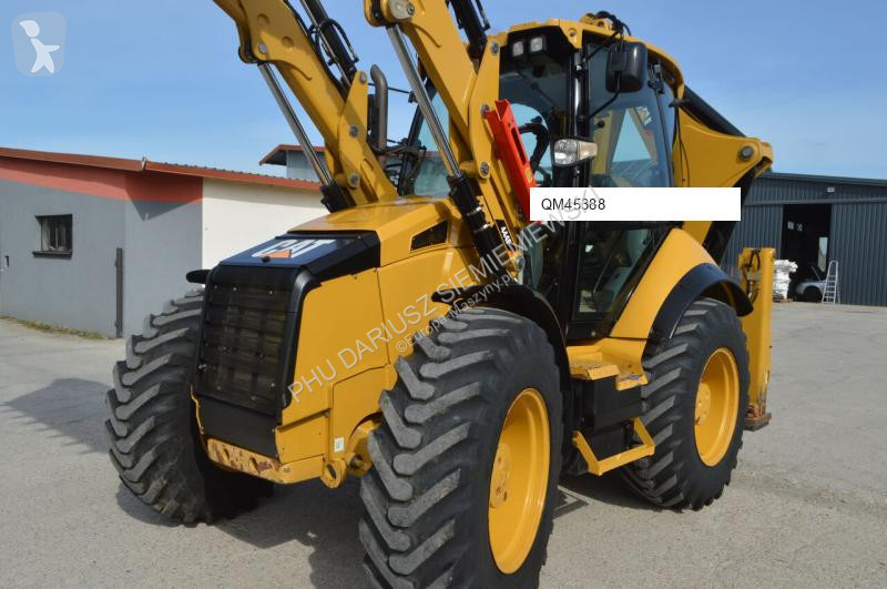 Traktor med grab Caterpillar 444F